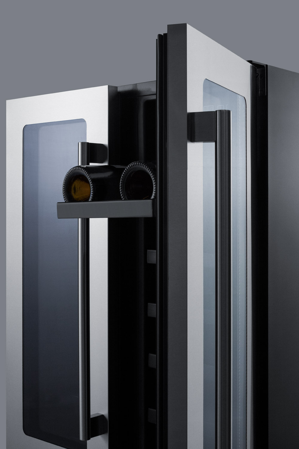 ADA compliant built-in or freestanding dual zone wine/beverage center with French door swing and seamless stainless steel trimmed glass doors